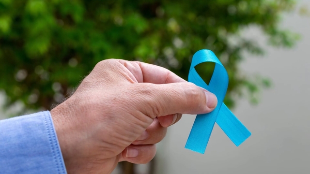 The blue Prostate Cancer ribbon.